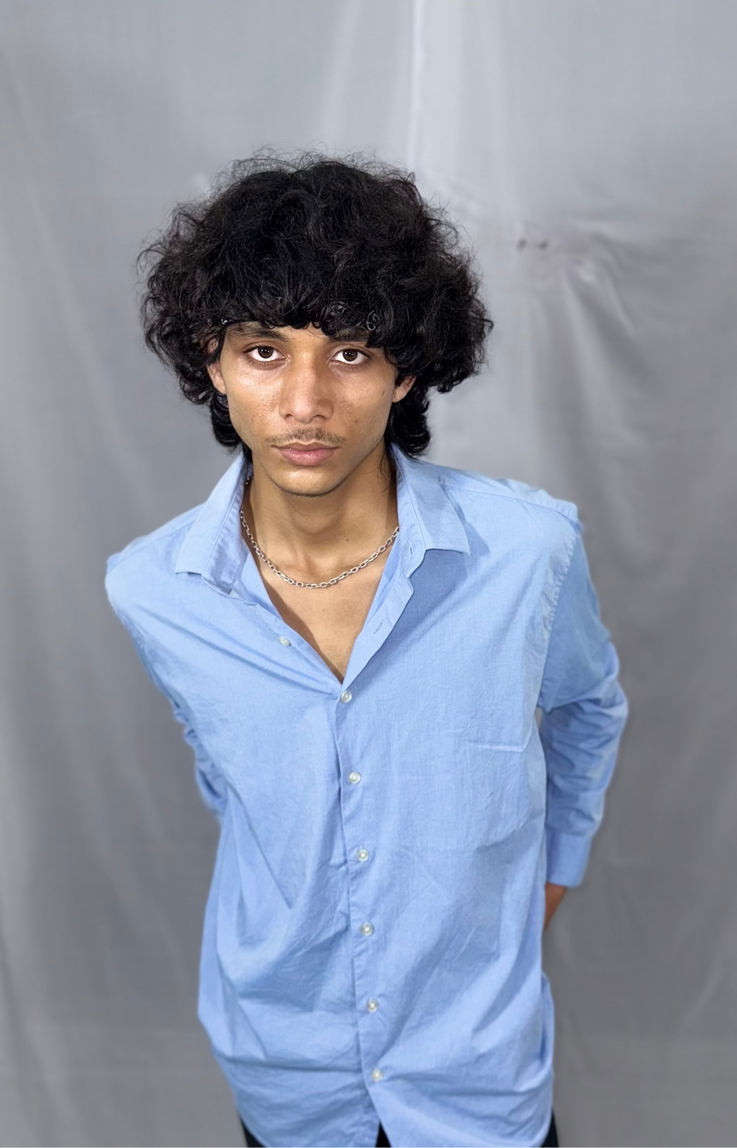 Light Blue Long-Sleeve Button-Up Shirt is available in size of L/32-34