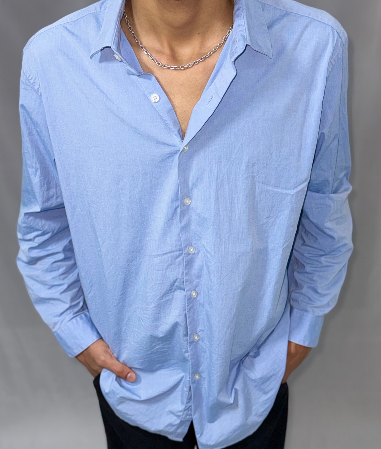 Light Blue Long-Sleeve Button-Up Shirt is available in size of L/32-34