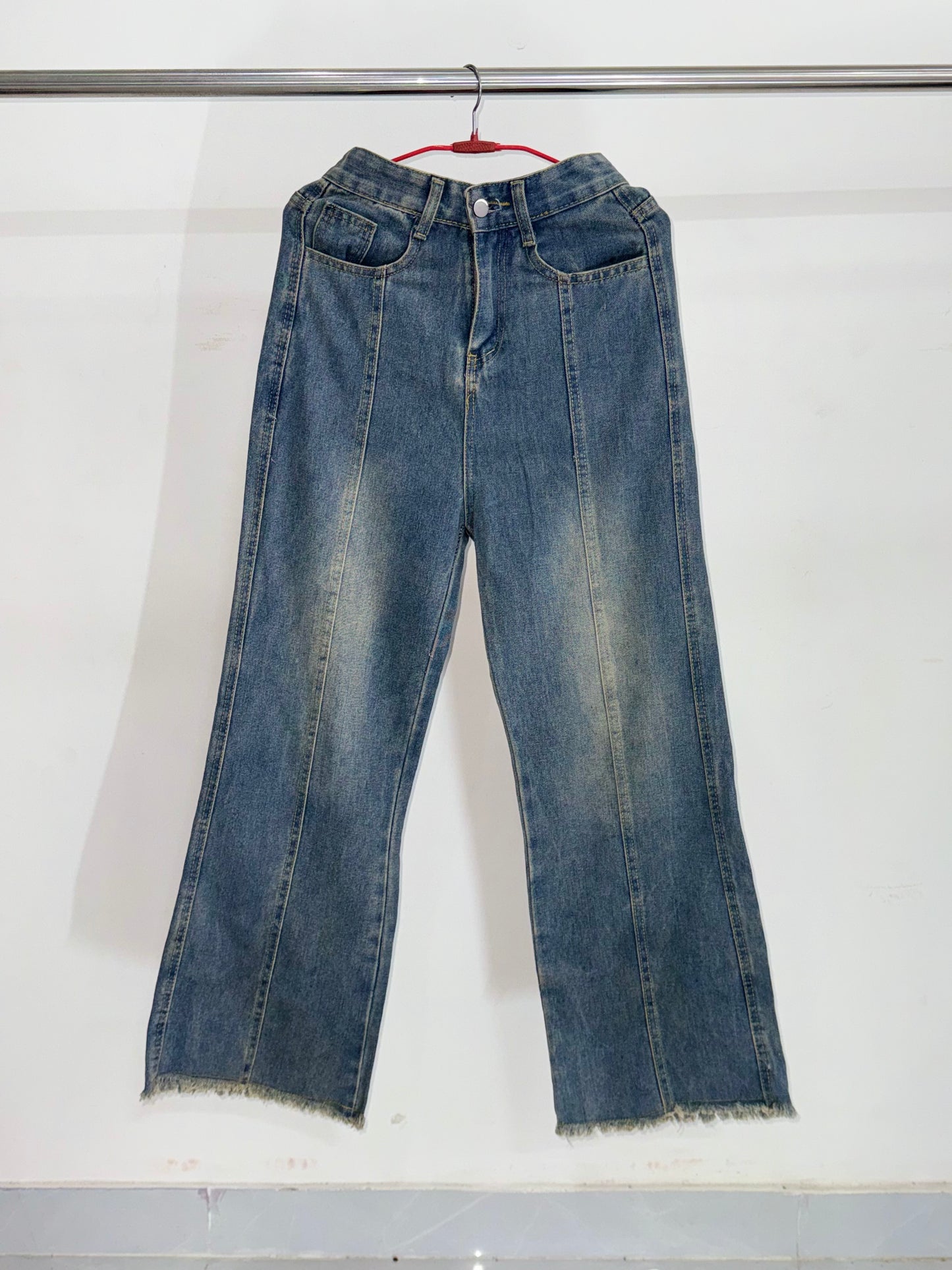 WASHED PLEATED JEANS IS AVAILABLE IN SIZE S/26-28